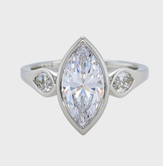 Marquise Cut Three Stone Engagement Ring